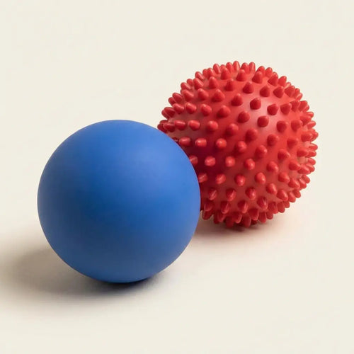 Blue lacrosse ball and red spiky massage ball