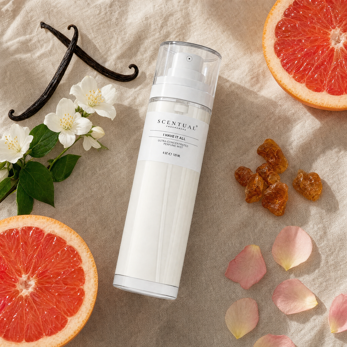 Perfume mist flat lay with grapefruit, vanilla and jasmine